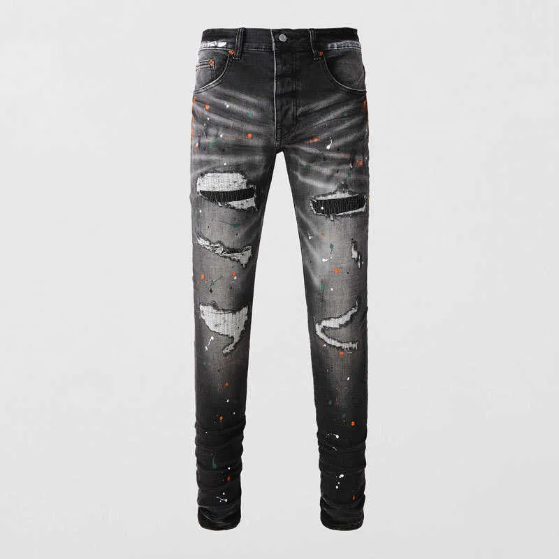 Jeans da uomo VIOLA slim fit microelastici con toppa ricamata nera e grigia, modello Broken Hole, di High Street Fashion_voghion.com