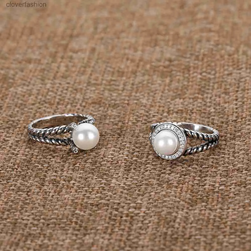 Anillo de perlas modelos de moda retro cuatro garras nuevo anillo de mujer de perlas de imitación