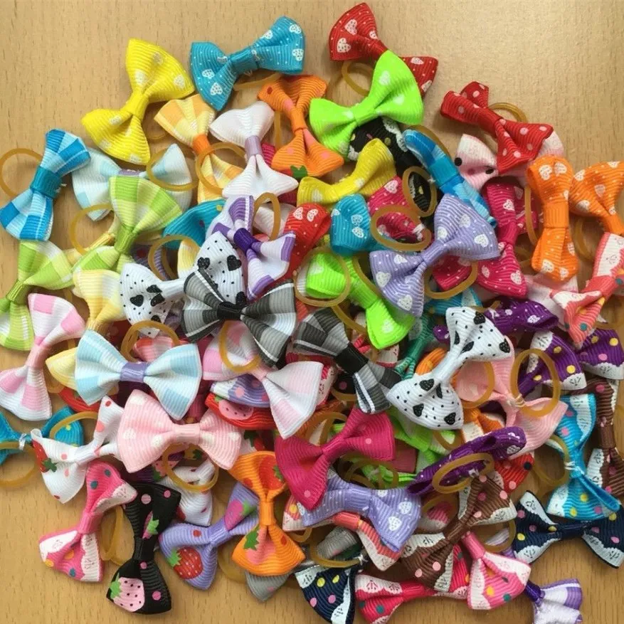 100pcs lot New Handmade Pet Products Dog Grooming Bows Dog Hair Accessories Pet Hair Tie Dog Bow Hairs rubber bands whole260Z