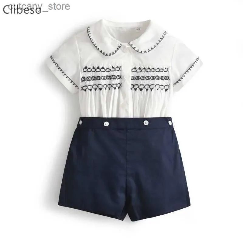 T-Shirts Baby Boy Kleidung Sets Säuglinge Neugeborene handgemachte gesmokte Kleidung Kinder Shorts Ärmel Tops Shorts Sommer Kinder britische Outfits L240311