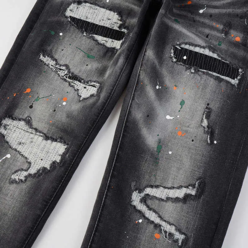 Jeans da uomo VIOLA slim fit microelastici con toppa ricamata nera e grigia, modello Broken Hole, di High Street Fashion_voghion.com