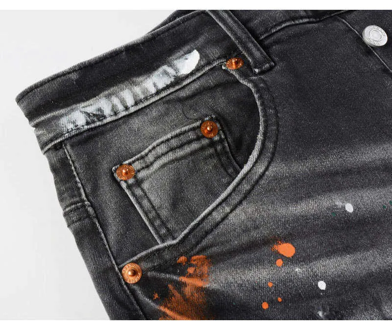 Jeans slim fit da uomo con ricami in nero e grigio_voghion.com