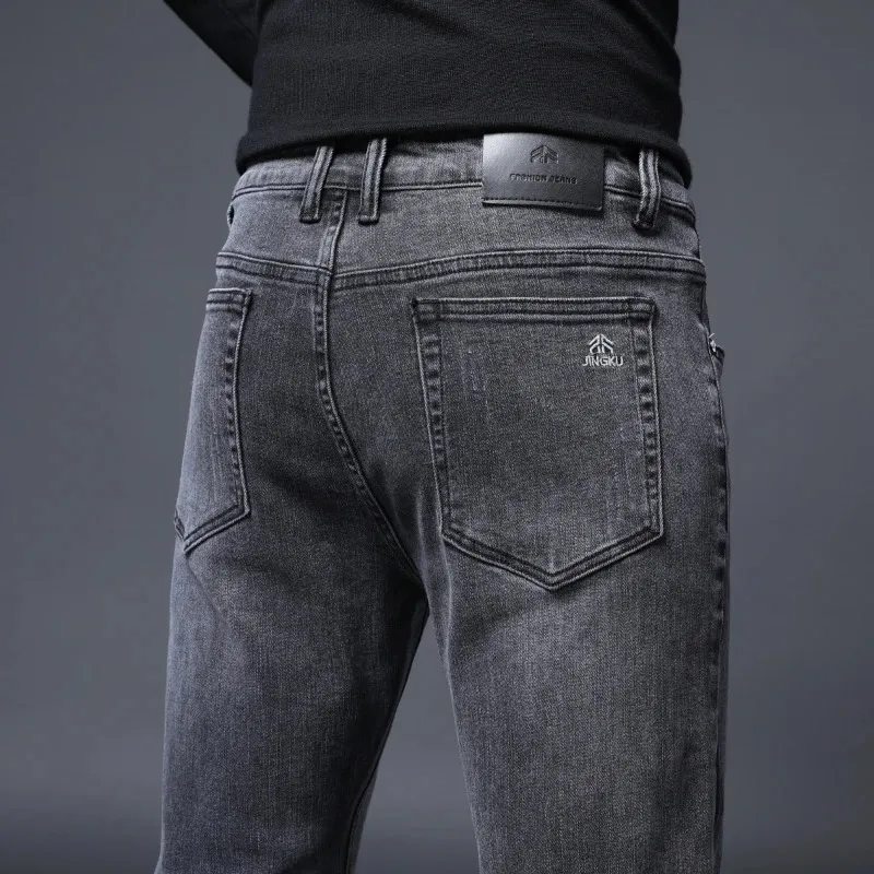 Jeans slim dritti da uomo moda coreano cotone elastico pantaloni denim quattro stagioni marchio di abbigliamento classico nero grigio 240305