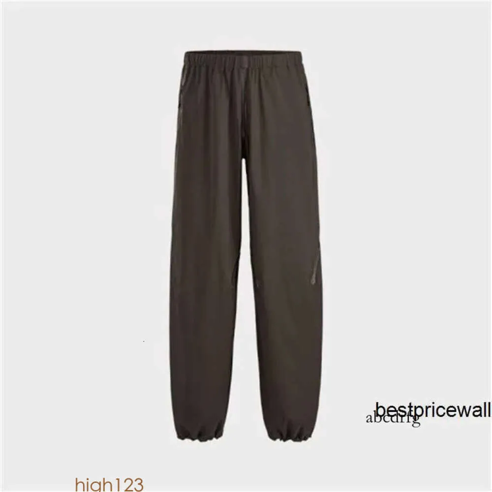 Canada Arcterys Hommes ARC'TERYS Archeopteryx SYSTEM_ A MOROZ OVERPANT Pantalon coupe-vent unisexe Arabica/poudre Noir L HBPN 94