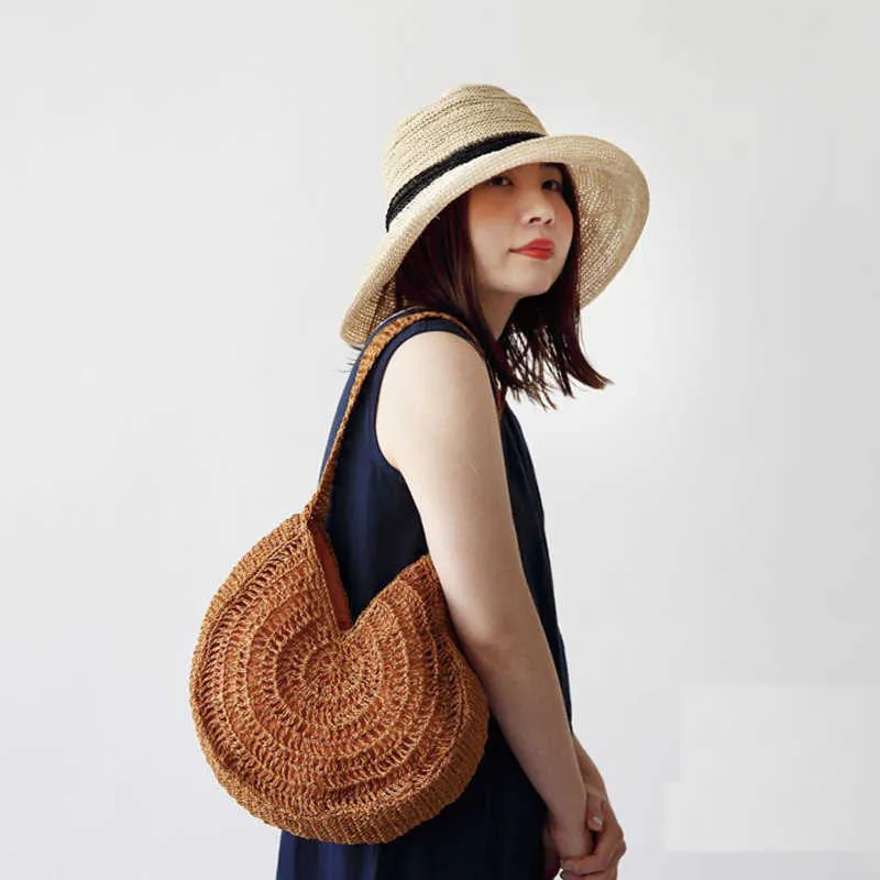 Versione coreana della borsa tessuta New Grass Borsa estiva da spiaggia per le vacanze da donna circolare ad alta capacità a spalla singola portatile 240312