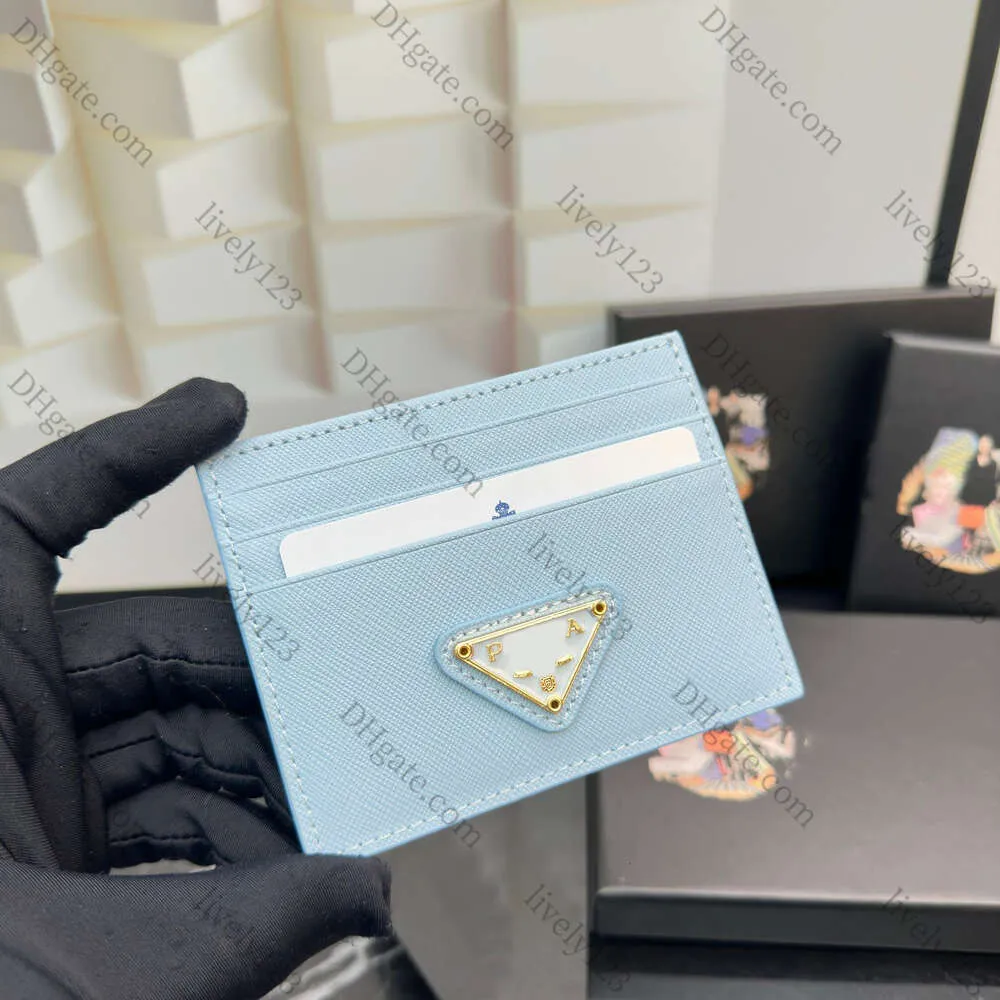 Haute qualité Femme Designer Titulaire de la carte Sac d'argent Femmes Portefeuille de luxe Designer Mini Portefeuilles en cuir Couleur Porte-cartes en cuir véritable Coin Hommes et femmes Porte-monnaie avec boîte