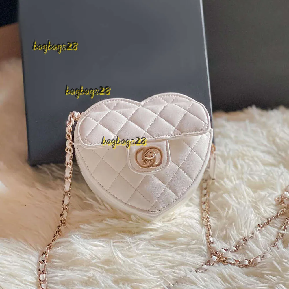 Omuz çantaları moda flep yarım ay debriyaj kalp çantaları lüks el çantası erkek tasarımcı tote pochette kamera crossbody çanta kadın gerçek deri kapitone alt koltuklu çanta