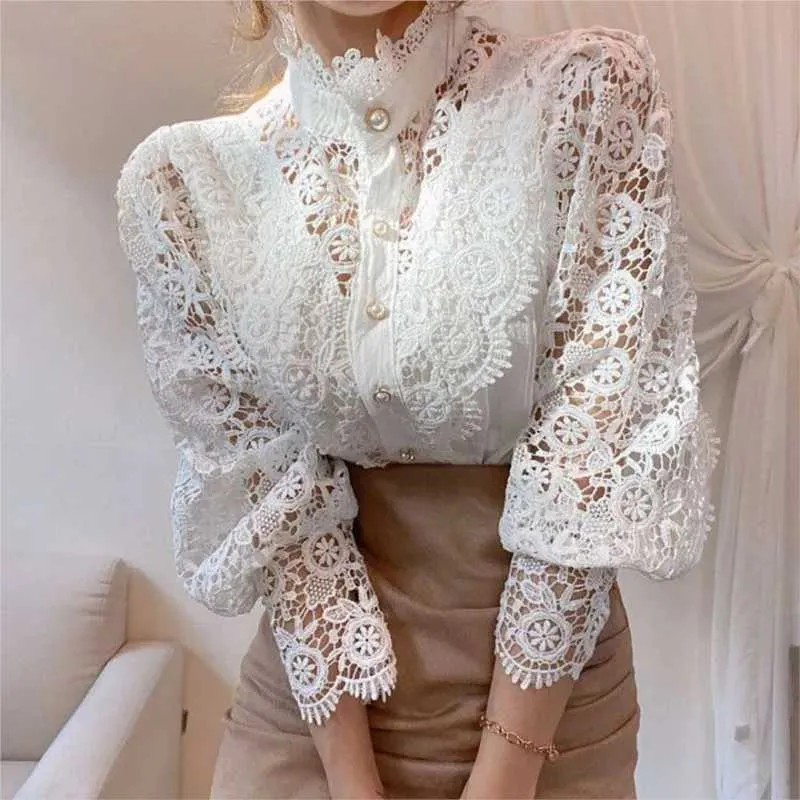 Blouses Femmes Chemises Blouse en dentelle blanche femmes printemps été sexy longue manche perle bouton fleur évider Blusas voir à travers la chemise en maille TopsL24312