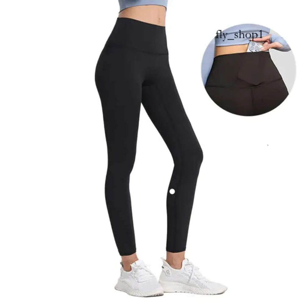 Lusso Aloyoga Leggings da donna Pantaloni da yoga Pantaloni da yoga Sport all'aria aperta Manica lunga Allenatore Palestra Donna Fitness sexy Pantaloni da jogging elastici Collant da allenamento D 674