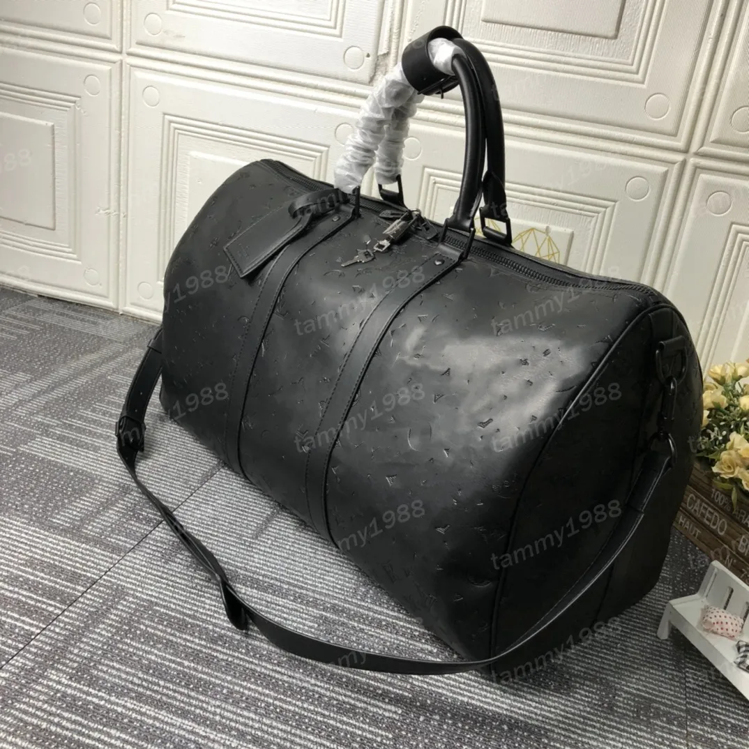 Duffel Bags Klassiker 50 cm Reisegepäck echtes Leder hochwertige Totes Umhängetaschen Herren Frauen Handtaschen 10A Duffel Bags Schatten geprägter graue Buchstaben 46117