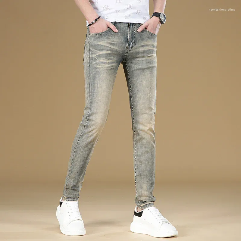 Jeans masculinos retro simples marca de moda magro ajuste magro high-end casual all-match estiramento desgastado olhando calças lavadas
