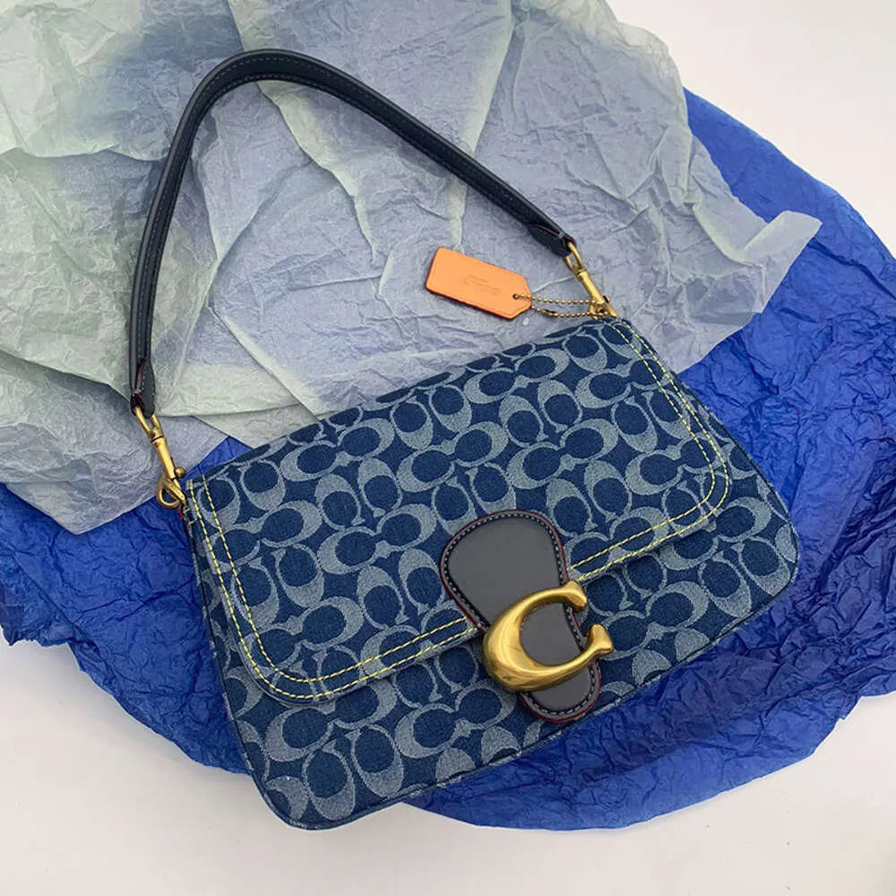Los bolsos de diseñador tienen un 90% de descuento más baratos 2024 Nuevo bolso para mujer Xiangbu Lei Cuero con lengüeta suave Bronceado Un hombro cruzado