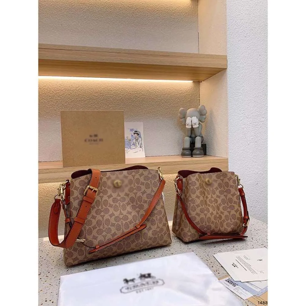 Bolsas de grife têm 90% de desconto Bolsa feminina mais barata 2024 Nova moda balde de couro genuíno grande e pequena bolsa crossbody de um ombro nas axilas