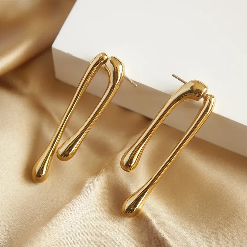 Bijoux à la mode géométrique 14k boucles d'oreilles en or jaune boucles d'oreilles géométriques vente chaude boucles d'oreilles pour les femmes cadeaux de mariage de fête