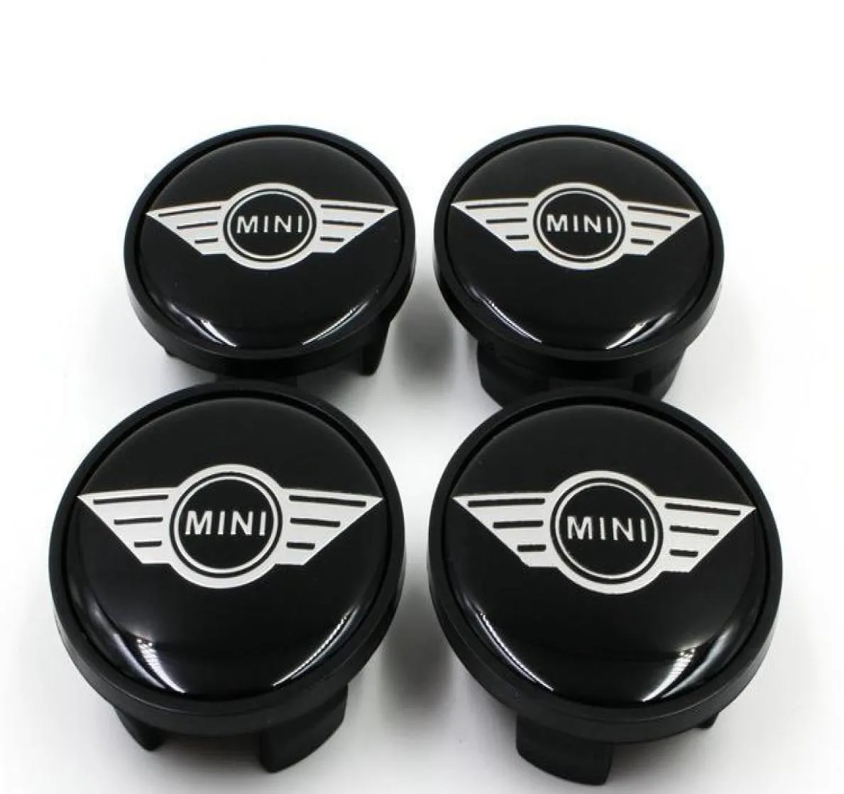 4PCSLOT 54mm ABS Black Car Emblem för Mini Cooper Mini Wings Wheel Center Hub Cap Cover Passar de flesta hjul Dammtätemblem 36311177598574