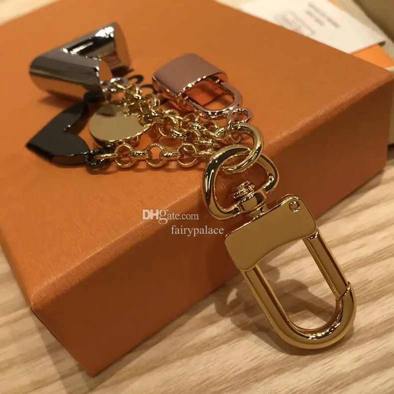 Keychains Lanyards Keychain Luxe ontwerper Gold Metal Key Buckle Classic Brand Letter Rose Lock Star Pendant Stijlvolle hoge kwaliteit Keychains Bag Ornamenten Y240426