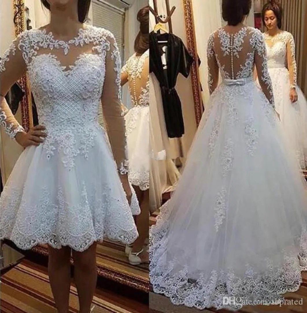 2020 Abiti da sposa eleganti con gonna staccabile Gioiello a maniche lunghe Sweep Train Appliques Abiti da sposa da giardino con cappella in rilievo Vesti7050341