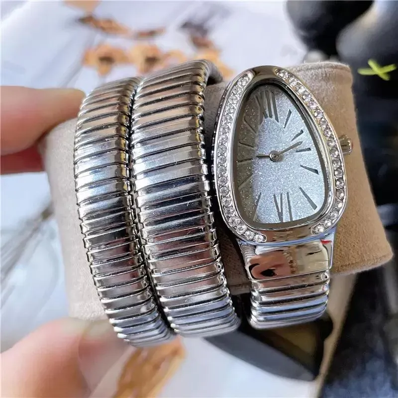Marque de marque de bracelet féminin dames forme de serpent diamant style luxe en acier métal band quartz horloge de mode concepteur de mode adapté durable 264a