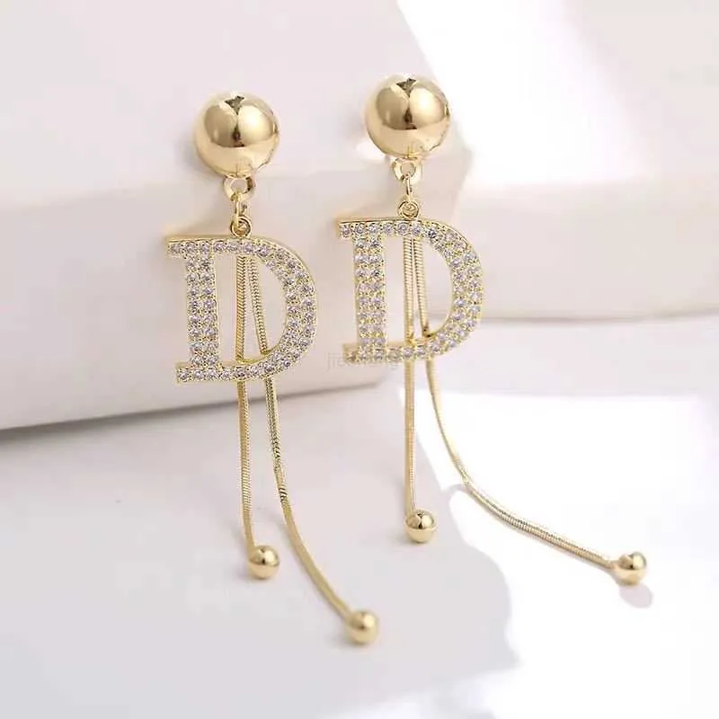 Dangle Chandelier boucles d'oreilles bijoux de créateur pendent 925 boucles d'oreilles en argent micro-zircon chaîne en os de serpent boucle d'oreille gland mots D