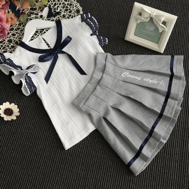 Vår sommar barnkläder baby kostym barn set bow blousetutu kjol skolflickor kjolar prinsessa mini veckade kjol 27 år y200823233399