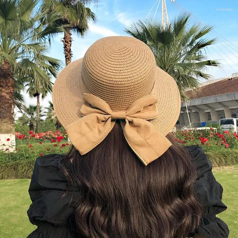 Ampla borda chapéus dobrável grande floppy meninas chapéu de palha sol com bowknot elegante proteção sombreamento moda praia bonés para mulher 2024