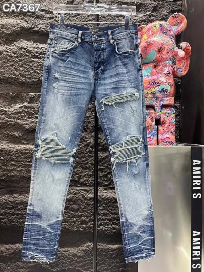 A MI Jeans pour hommes de haute qualité Jean de motard en détresse Jean Rock Skinny Slim Bande de trou déchiré Pantalon en denim brodé de serpent à la mode