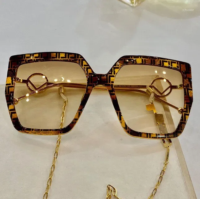 Óculos de sol designer de luxo 0410s mulheres clássico moda compras grande caixa óculos com corrente de metal lente anti-ultravioleta