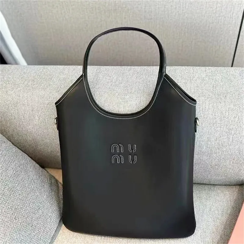 Miui Classic Shop Sac à main Sac de luxe de luxe Top qualité Femmes les fourre-tout Sacs de voyage à bandoulière en cuir pour hommes Portefeuilles à bandoulière Pochette Sacs à couches sous les bras