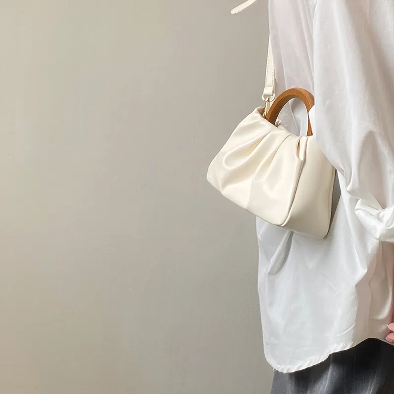El çantası tasarımcı çantası moda omuz çantası kadınlar klasik çok yönlü crossbody büyük ve küçük tuval alışveriş büyük kapasiteli açık seyahat çanta 001