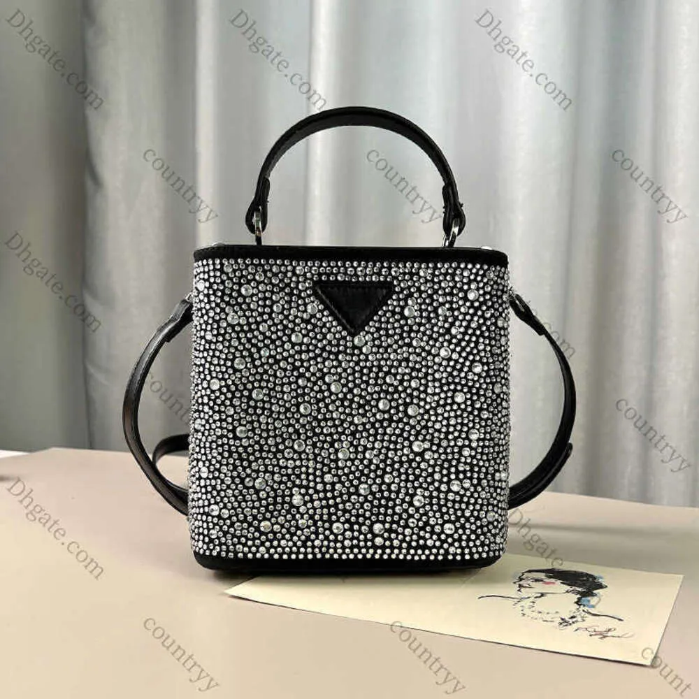 Mini sac seau incrusté pour femmes, nouvelle mode, sens avancé, diamant chaud, épaule, sac à main à bandoulière, les magasins sont en liquidation, vente en gros