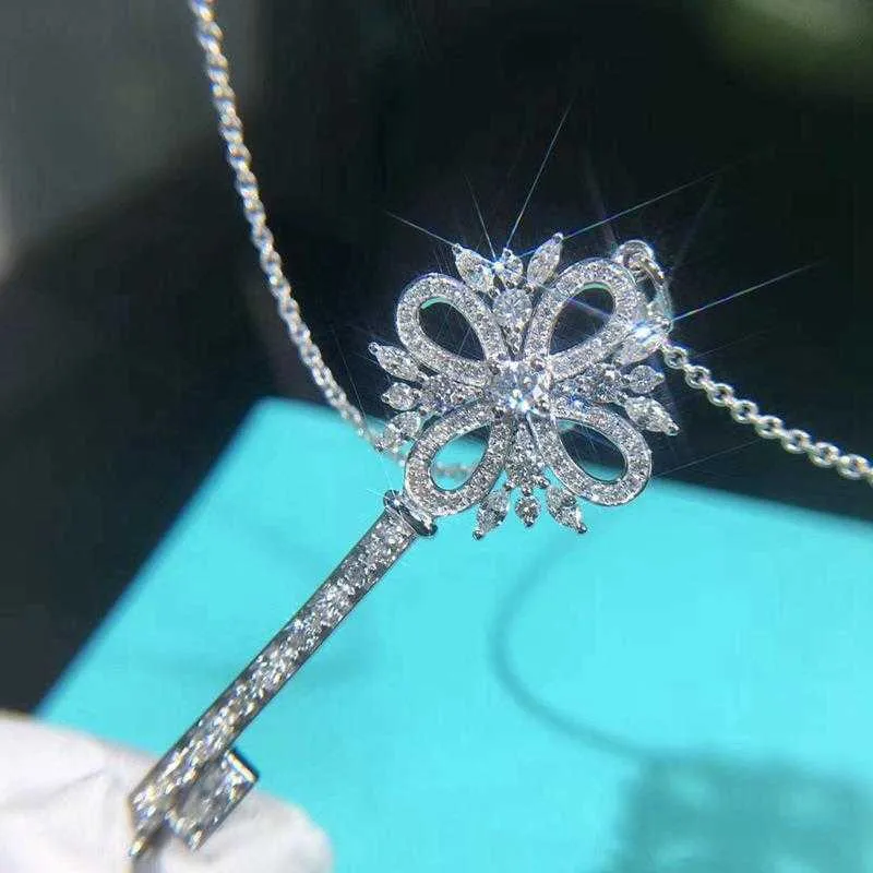 Designer Tiffany and Co Collier clé en argent sterling 925 plaqué 18 carats Goldie Family Flocon de neige Oeil de cheval Pendentif Chaîne de pull