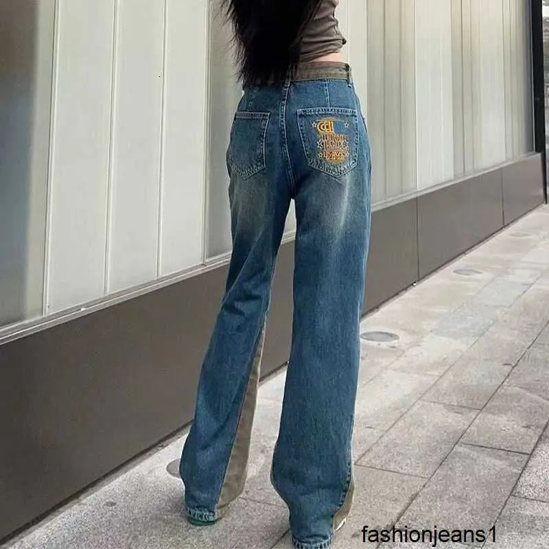 Jeans femininos versão alta CE Home 23 AutumnWinter New Yeast Stone Grinding and Drifting Back Bag Corte peças bordadas feitas à mão gato barba emendando jeans para mulheres