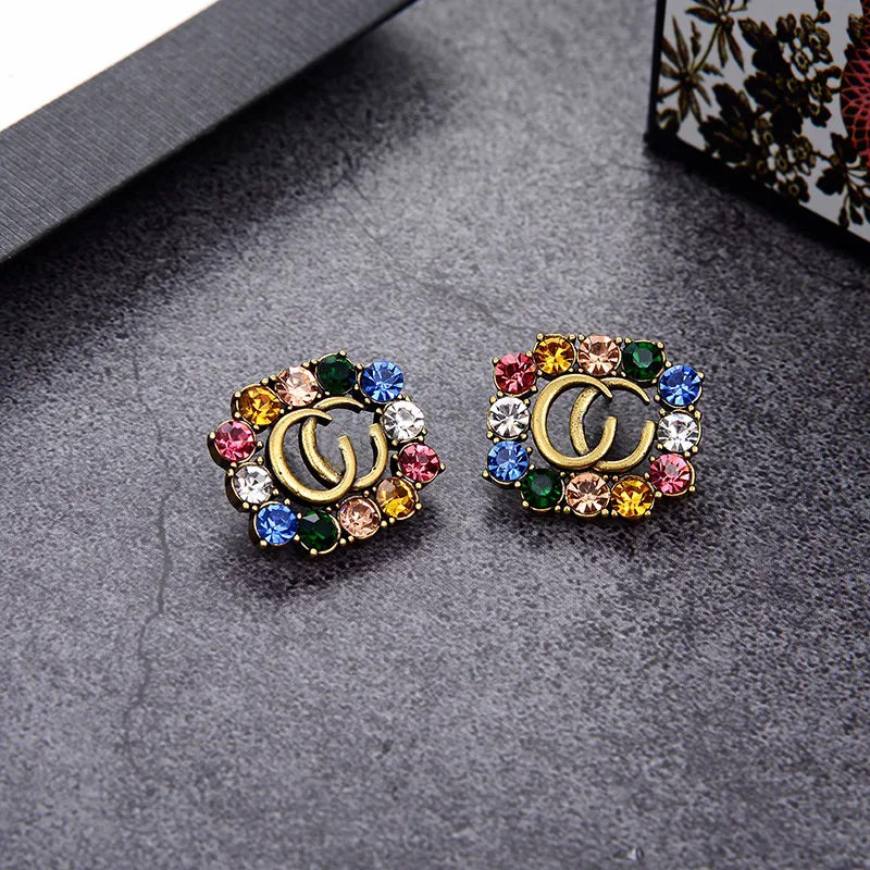 The latest color diamond G stud earrings create high-end beautiful women's jewelry to cry