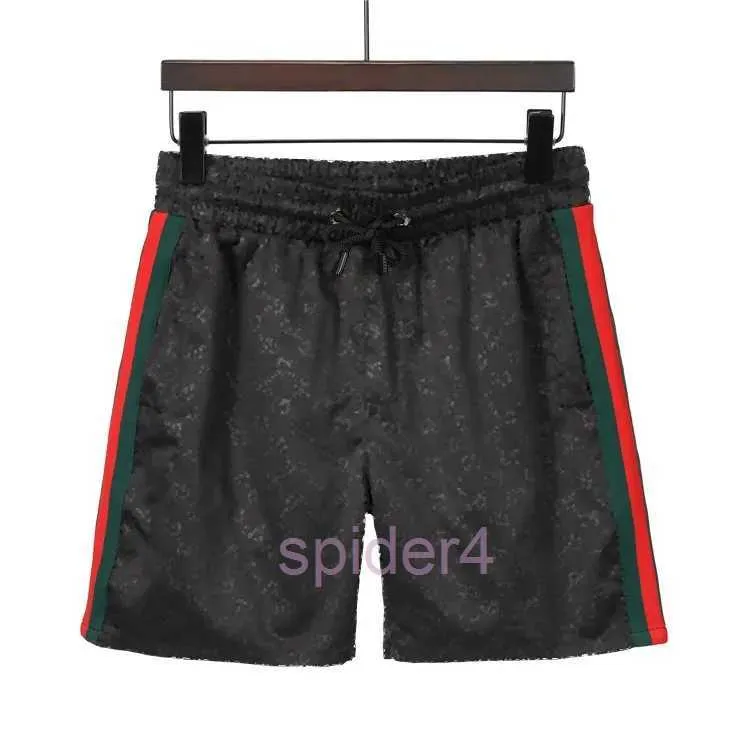Calças de pista de tecido à prova d'água estilo designer calças de verão calças de praia masculinas calções de banho de surf shorts esportivos xkbw