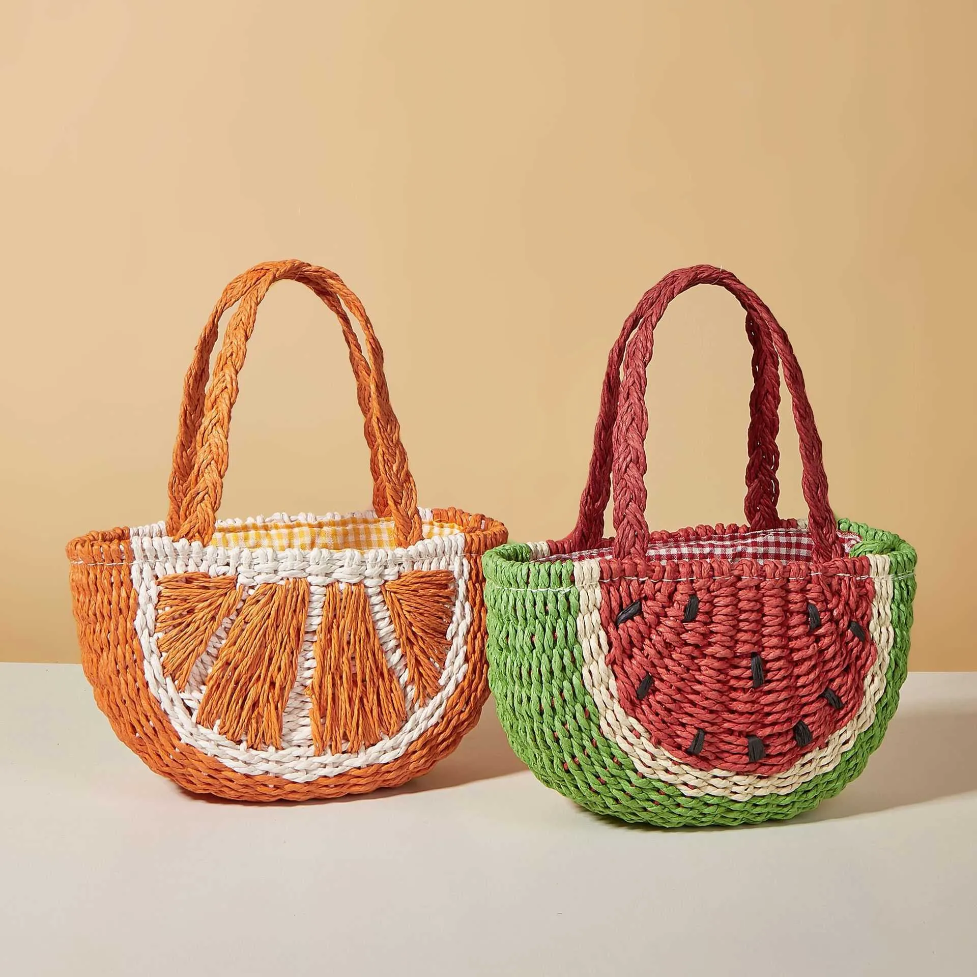 2023 Nuevo bolso de frutas Bolso tejido de paja de sandía naranja Un hombro Bolso cruzado para niños Bolso de mano para mujer Bolso de playa lindo Tide 240315