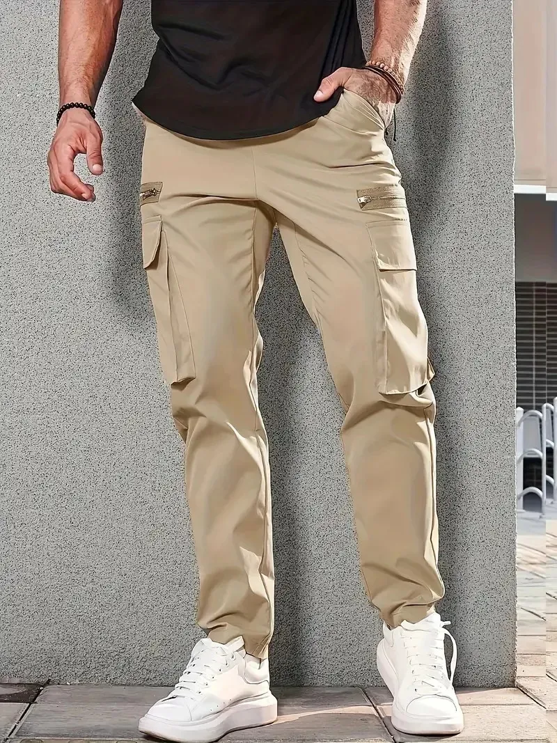 Pantaloni da uomo Tasche laterali Pantaloni cargo harem Cerniera nera Pantaloni da jogging maschili hip-hop casual Moda streetwear 240315