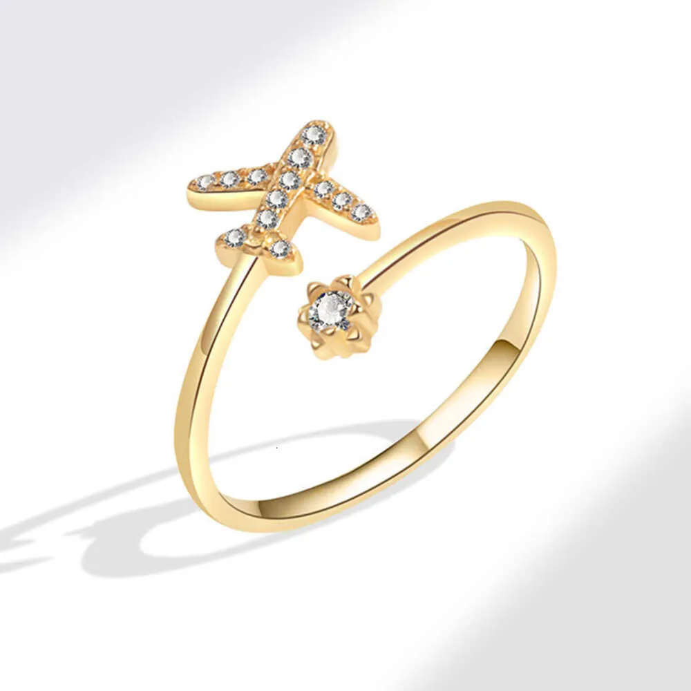 Fashionabla kvinnors flygplan Zircon Open Ring, Wind Plated Gold Ring smycken för kvinnor