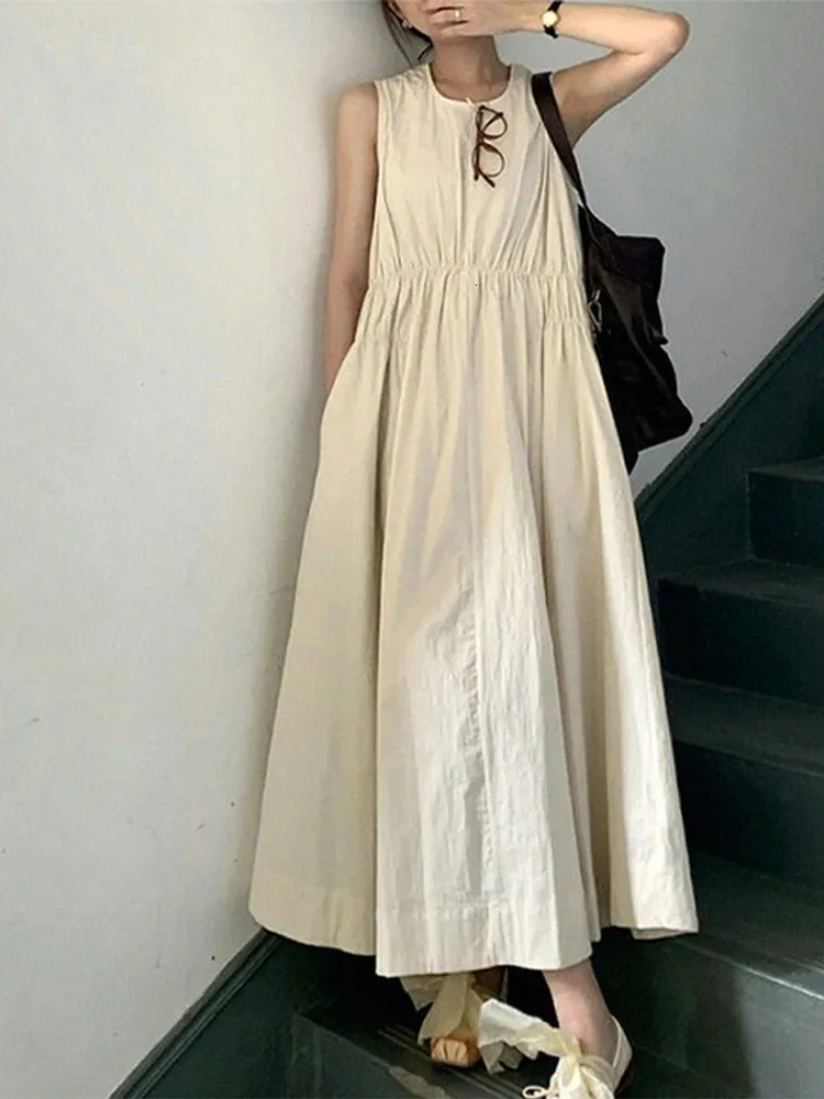 Liten remmar ärmlösa tankkvinna klänning japan preppy stil oneck aline sommar solid lös kvinnlig elegant midlängd kjolar 240315