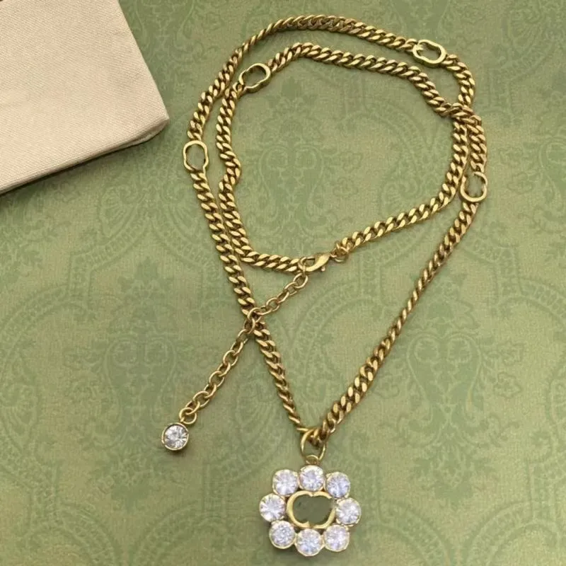 Design classique bijoux mode G pendentif amour collier femmes toutes sortes de diamants titane acier double anneaux femmes or collier bijoux de mariage cadeau
