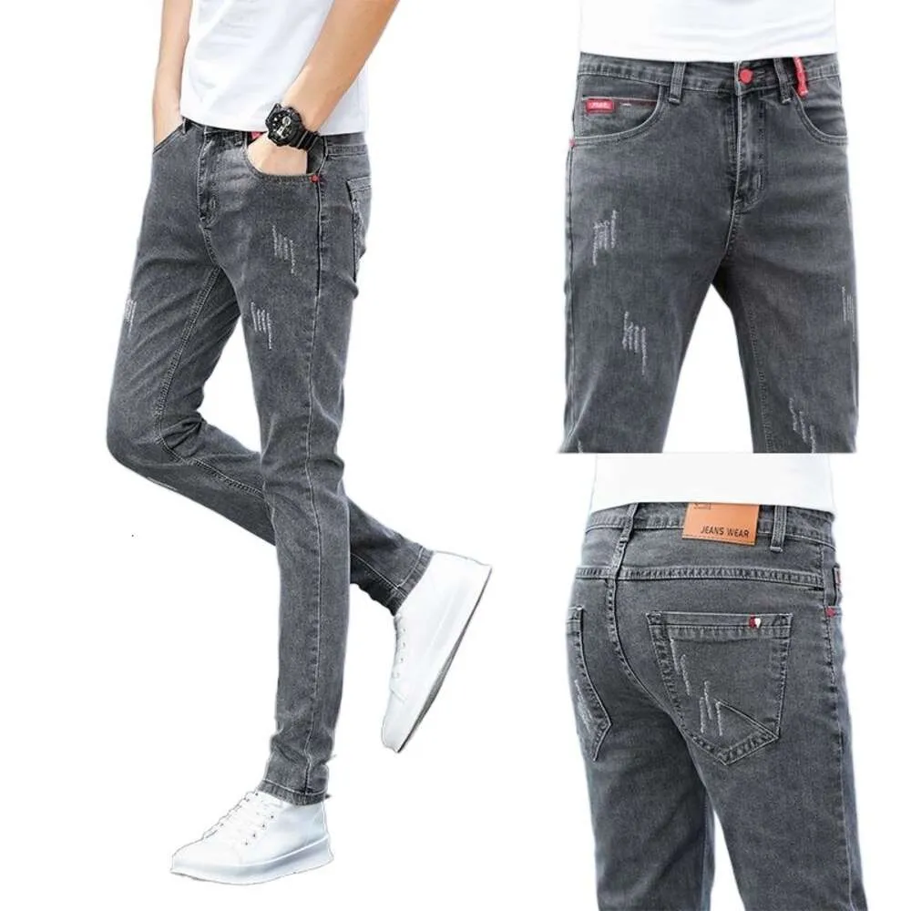 Lente nieuwe jeans Koreaanse veelzijdige trendy elastische slanke pasvorm kleine voeten heren casual lange broek voor heren