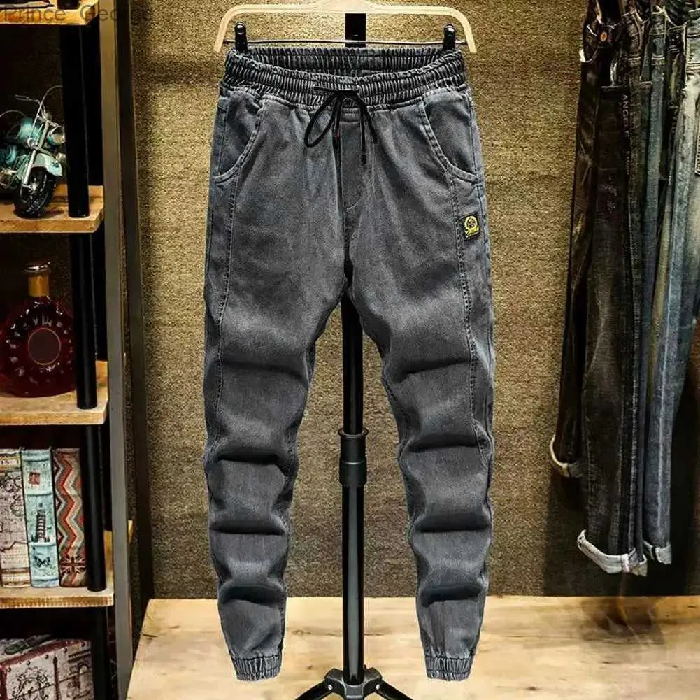 Mäns jeans trendiga män jeans elastiska midja streetwear bottnar hög midja ankel bundet harem pantl2403