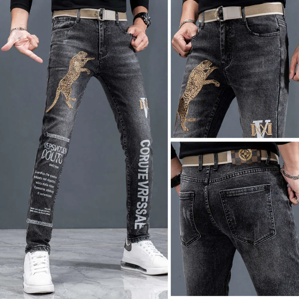 Broderad högkvalitativ för män, trendig, smal montering, elastisk och avslappnad Guangzhou Xintang-jeans