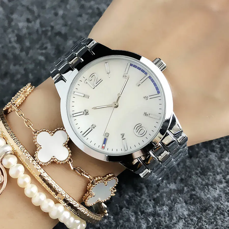 2024 Fashion Brand Wrist Watch for Women Lady Girl Steel Steel Metal Band Quartz Watches Tom 04