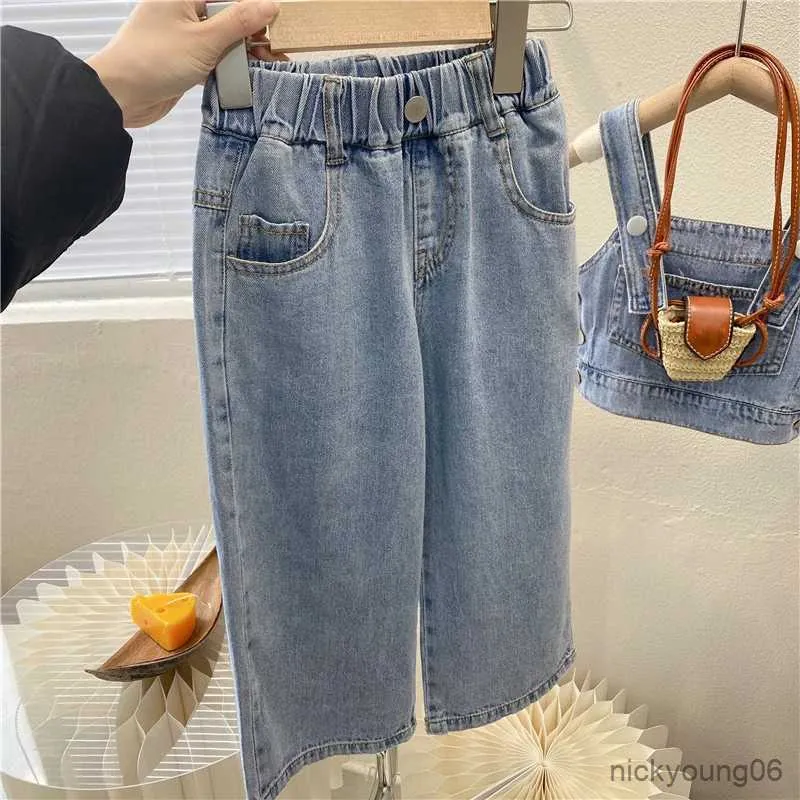 Set di abbigliamento Nuovi set di abbigliamento per ragazze estive Bottoni tascabili Gilet di jeans da strada + Pantaloni a gamba larga Moda Baby Kids Outfit Abbigliamento per bambini Tute