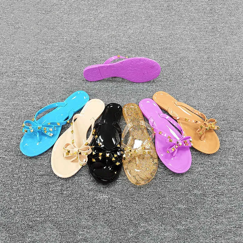 HBP Niet-merk goedkope vlinder zomer nieuwe dames heldere parels slides slippers platte klinknagels jelly sandalen slippers voor dames