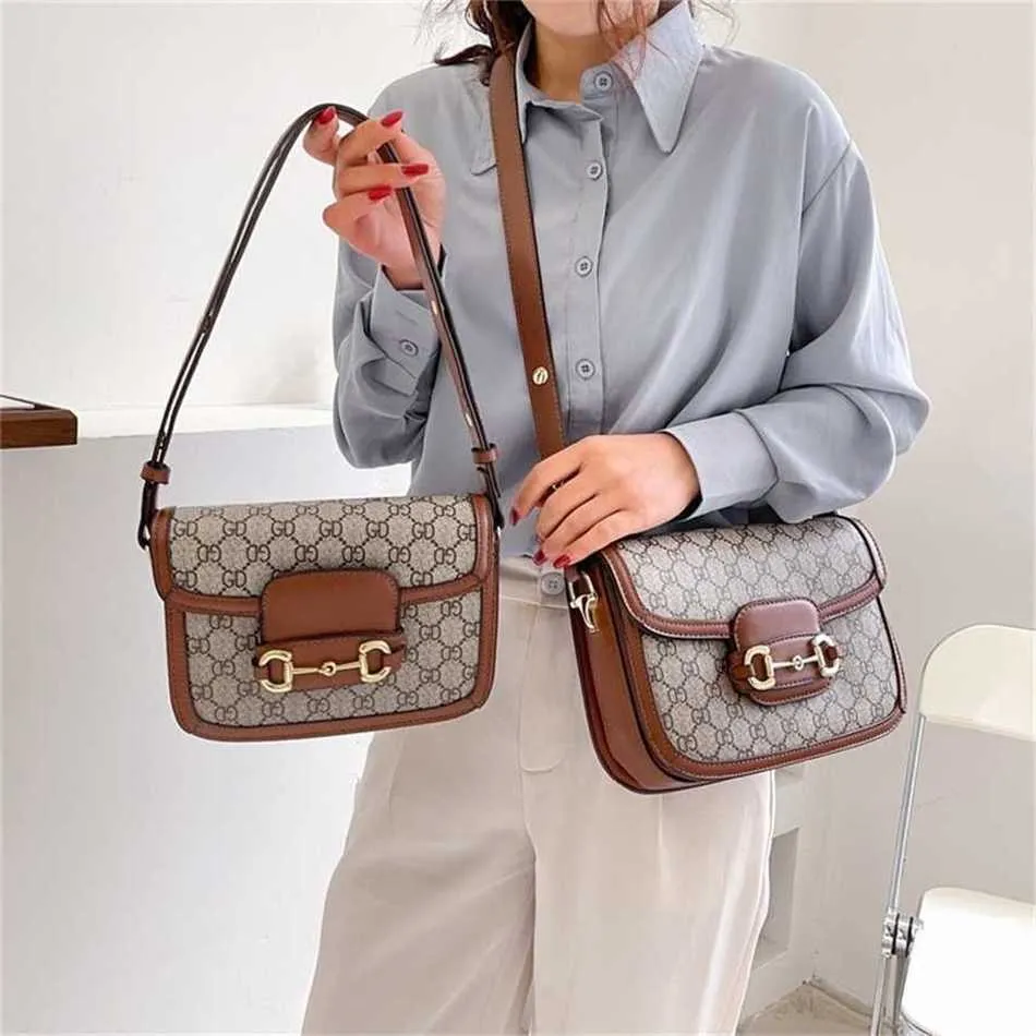 2024 Network Red Hot Vendre une nouvelle texture Saddle Trend Style Single Single Crossbody Handbag Sac à main 60% de réduction sur la boutique en ligne