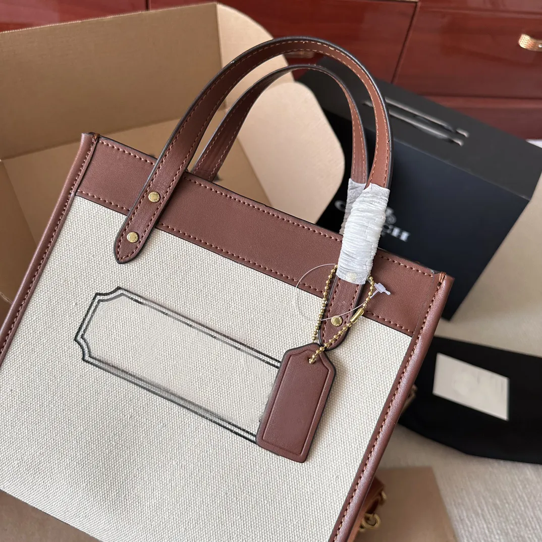 Designer handväska liten enkel stor kapacitet tygväska stjärna axel handväska mode pendlare kvinna väska
