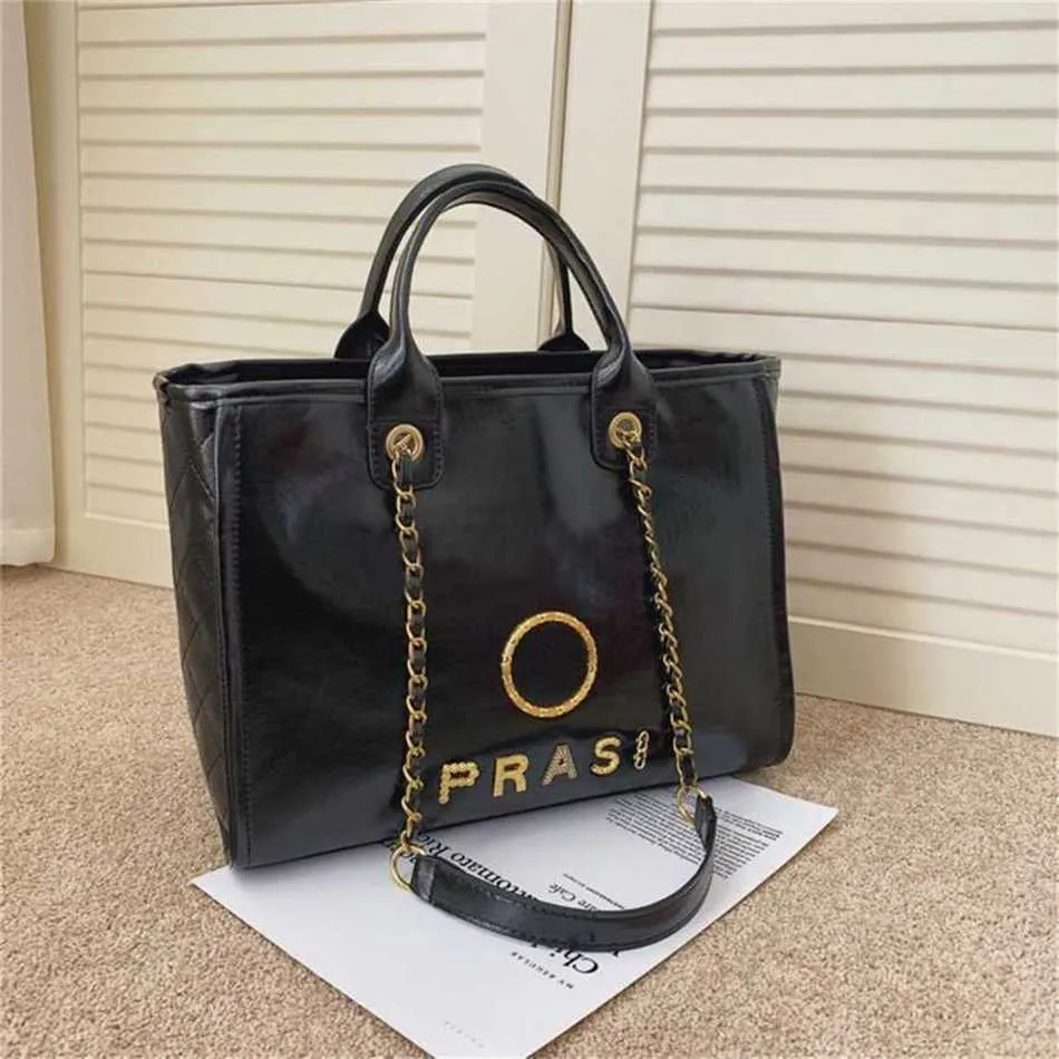 Borse classiche badge metallica tote piccola borse da sera capacità femminile grande zaino in pelle con spalla in pelle fjae vendita del 60% fuori dal negozio online