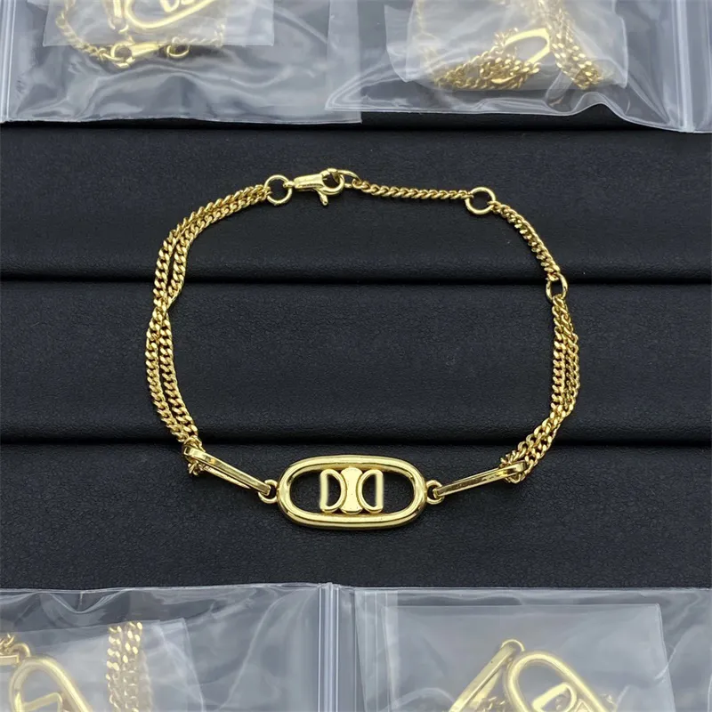 Ihålig hjärtdesigner armband plätering av guld dubbelkedjor trendiga armband geometriska justerbara spänne armband engagemangsjubileumsgåva ZH186 E4