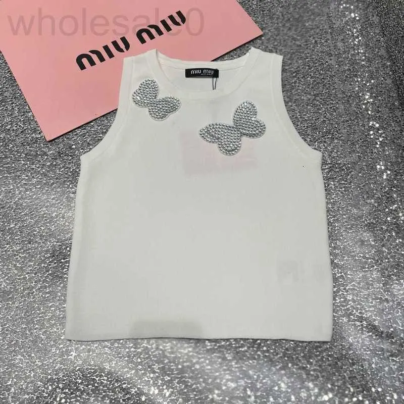 Tanques femininos camis designer mi24 início da primavera novo estilo menina indústria pesada prego diamante arco sem mangas fino ajuste curto versátil malha tanque top 5nfa